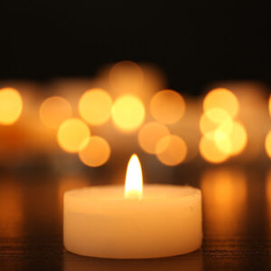 Burning candles on dark background Burning candles on dark background